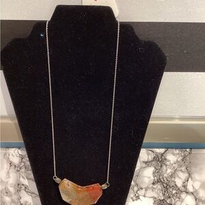 Elegant Silver Necklace with Earthy Pendant